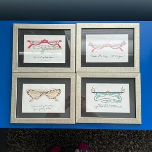4 Framed eye glass photos.